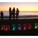 As the sun sets and the lanterns begin to glow brighter in the darkness, folks remember loved ones who have died during a Nov. 4 community lantern lighting ceremony at Heisler Park in Laguna Beach. ARMANDO BROWN, FOR THE REGISTER